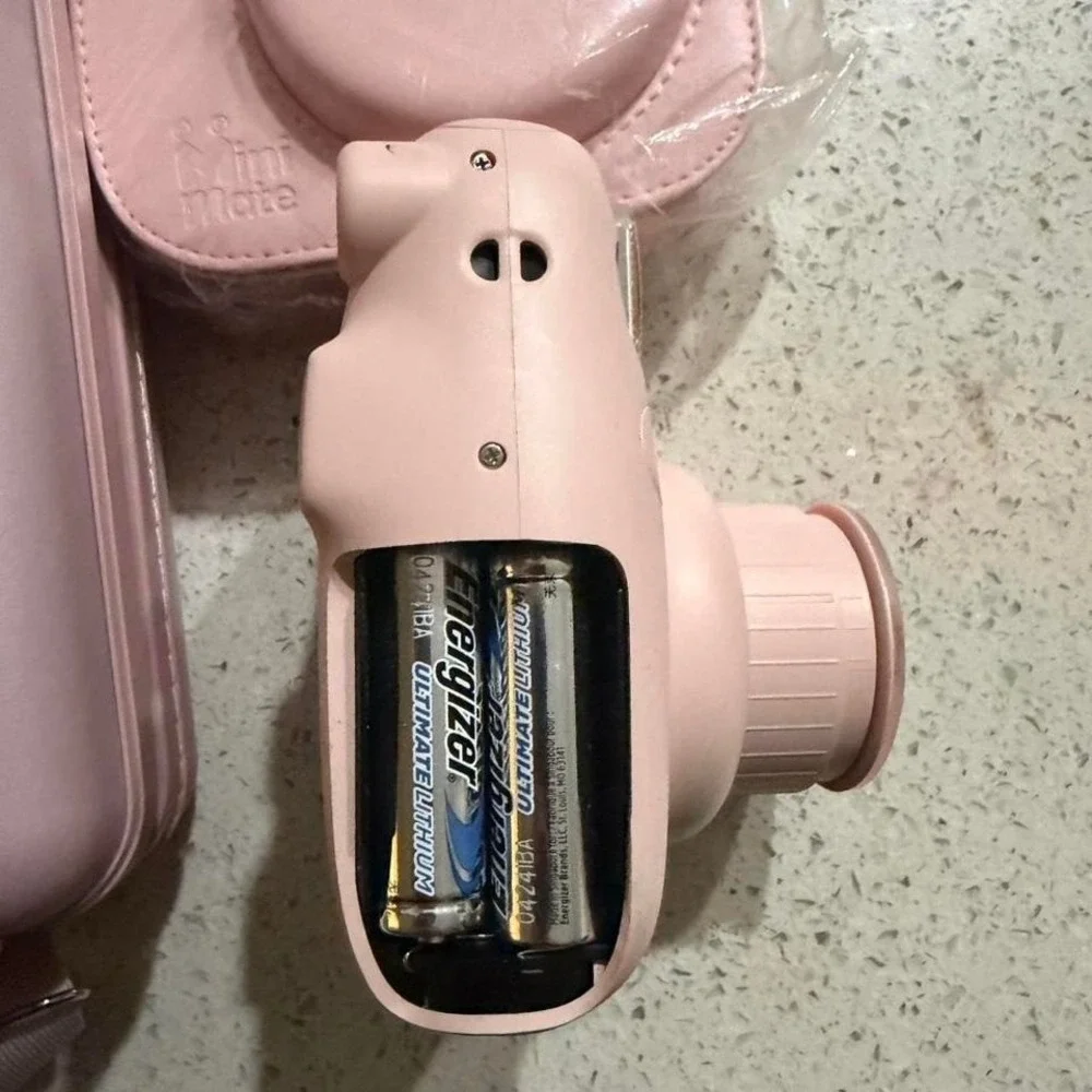 Pink Instax Mini 9 camera with‎ 2 case and strap no battery cover